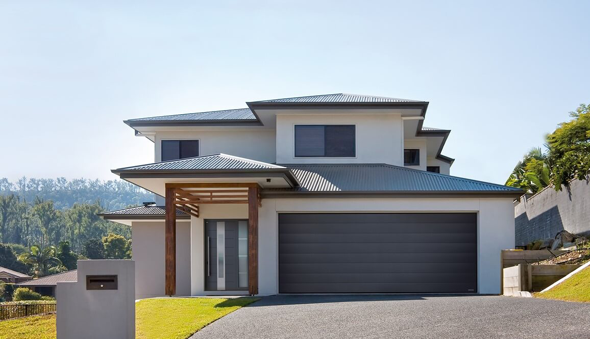 Referenz: Sektionaltor und Tür von Wisniowski - Clever-Bauen.de